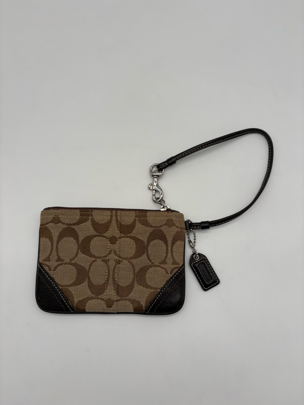 Brown Coach Monogrammed Wristlet